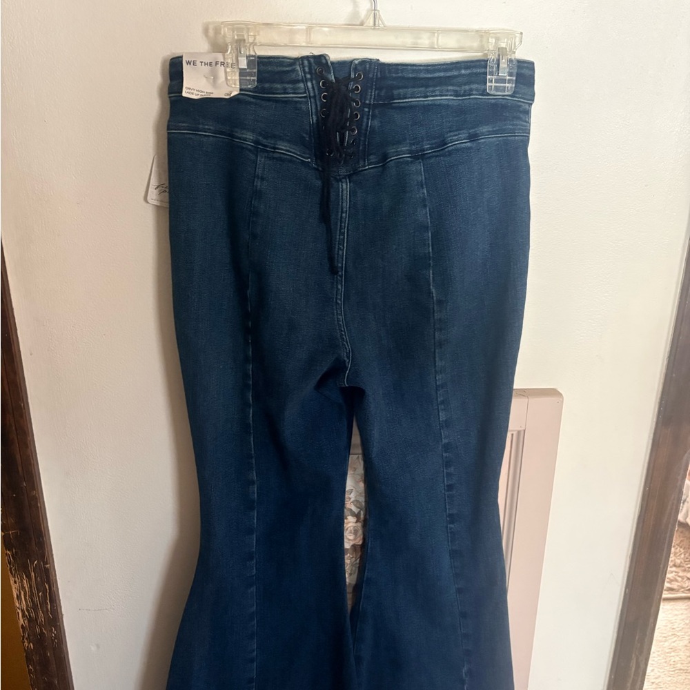 We The Free Dark Blue Lace-Up Flare Jeans